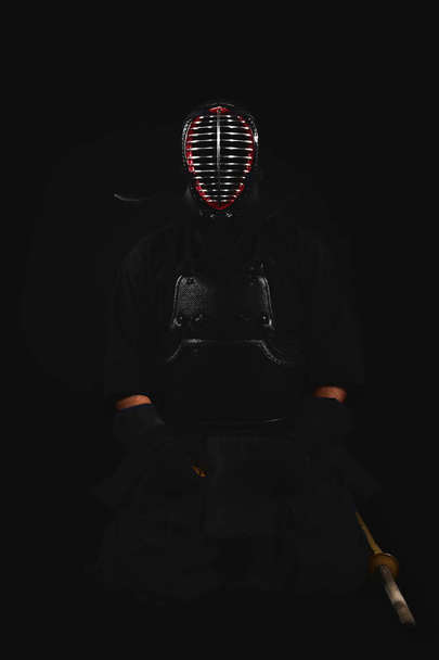 Kendo fighter with shinai (bamboo sword) Tradition kendo armor - Fotó, kép