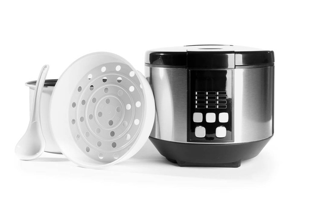 Modern multi cooker with accessories on white background - Foto, immagini