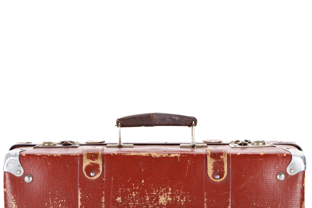 白で隔離されたレトロな茶色のスーツケースのハンドルのクローズアップビュー - 写真・画像