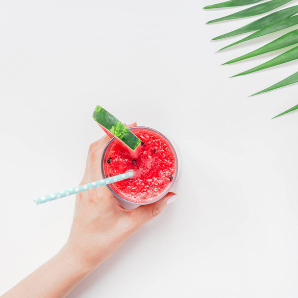 Woman hands with watermelon smoothie drink glass - Zdjęcie, obraz
