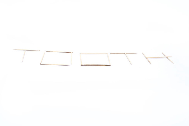 Photo of toothpicks design. Isolated on the white background. - Photo, Image