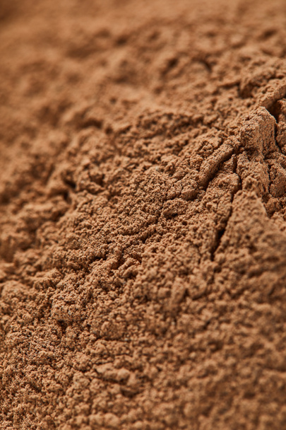 close up view of brown textured clay powder  - Foto, Bild