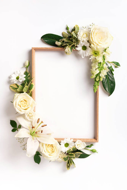 Frame of rose, lily, gerbera flowers over white background. Valentines day, Woman day concept. Spring or summer banner with copy space. Banner - Fotó, kép