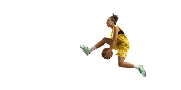 Isolated Female basketball player makes slam dunk. Basketball players on white background - Photo, Image