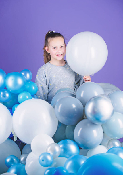 The happiest holiday. Small child. Adorable child with helium balloons. Cute little child with air balloons. Girl child celebrating on birthday - Photo, image