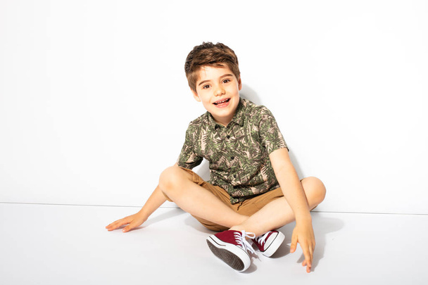 young boy posing on white background - 写真・画像