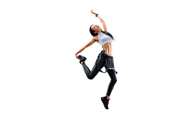 Samostatná ženská hip hop tanečnice. Krásná dívka tančí na bílém pozadí - Fotografie, Obrázek