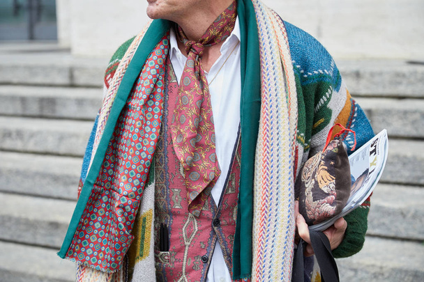Man with colorful scarf and white shirt before Frankie Morello fashion show, Milan Fashion Week street style  - Фото, изображение