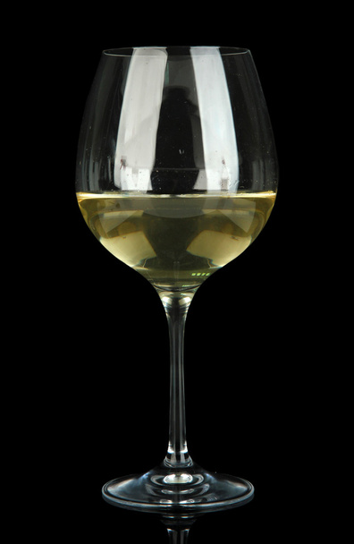 Glass of white wine, isolated on black - Fotó, kép