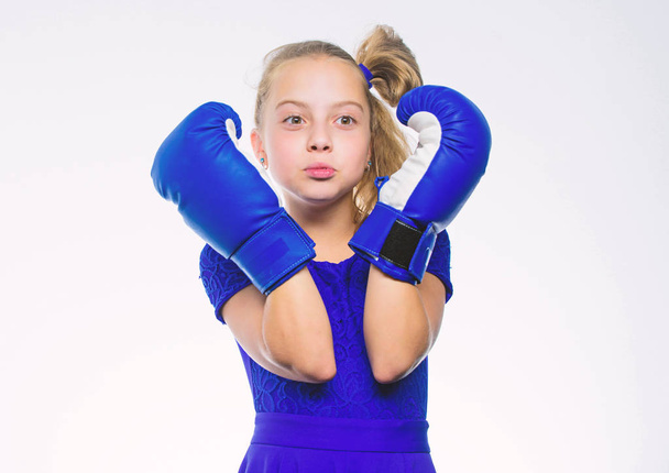 Be strong. Girl child with blue gloves posing on white background. Sport upbringing. Upbringing for leadership and winner. Strong child boxing. Sport and health concept. Boxing sport for female - Φωτογραφία, εικόνα