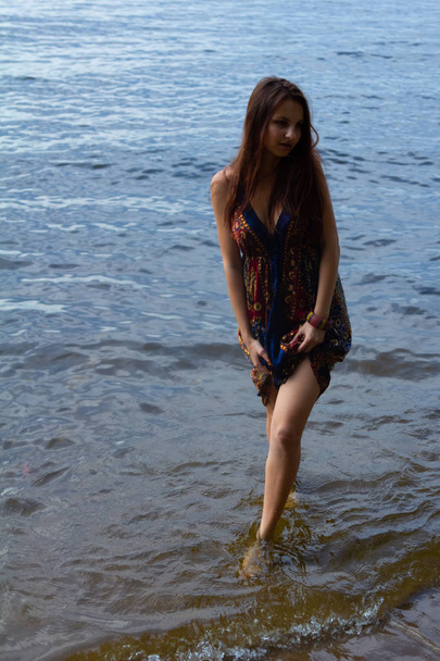 Beautiful Sexy Girl in Dress Standing and Posing in Water - Valokuva, kuva