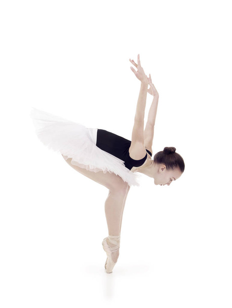 Gorgeous ballerina, in a white tutu dancing ballet. - Foto, afbeelding