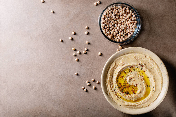 Hummus with olive oil - 写真・画像