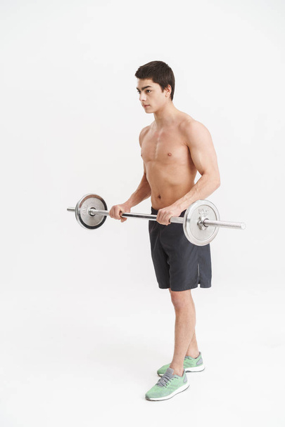 Confident fit young shirtless sportsman - Фото, зображення