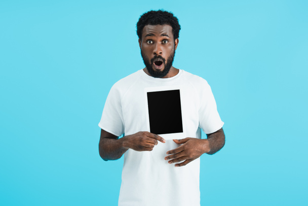 excited african american man showing digital tablet with blank screen isolated on blue  - Photo, Image