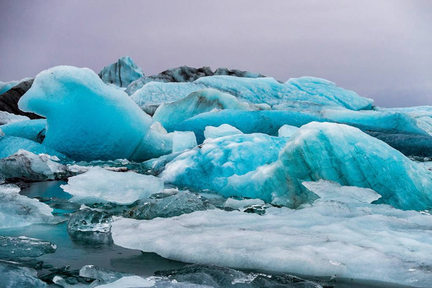 Icebergs in the glacier lagoon of Joekulsarlon in Iceland, Europe - Foto, imagen