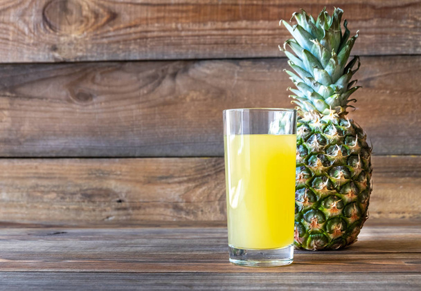 Glass of pineapple juice - Fotó, kép