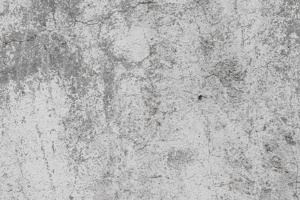 The texture of the old grey concrete wall with scratches, cracks, dust, crevices, roughness, stucco. Can be used as a poster or background for design - Photo, Image