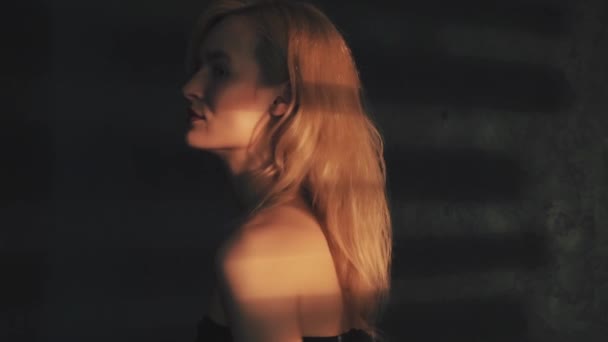 Lines of shadow on the girls face in room - Záběry, video