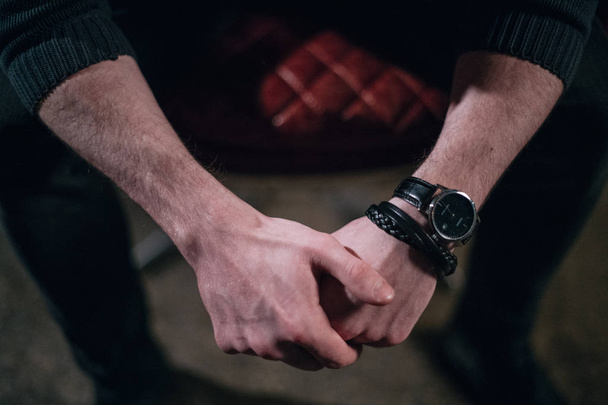 Close-up of strong male hands in watches. Gestures - Fotó, kép