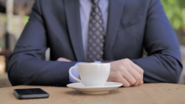 Close Up of Businessman Drinking Coffee - Кадры, видео