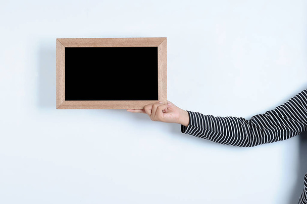 ásia mulher mãos segurando blackboard
 - Foto, Imagem