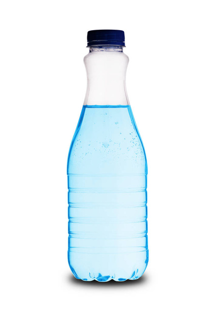 een grote volle fles water - Foto, afbeelding