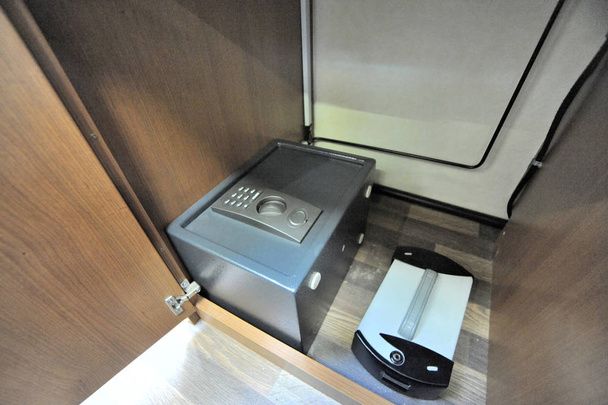 Two Small built-in safes on floor of RV - Photo, Image