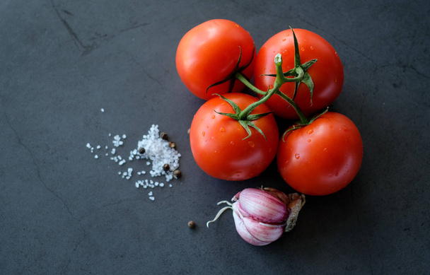 Food ingredients for pizza on black background, as tomatoes, cheeze or mushrooms - 写真・画像