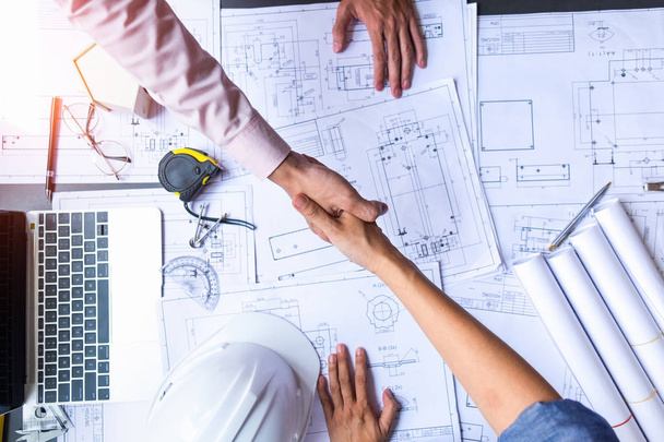 engineer people shaking hands in office, engineering concept, ar - Photo, Image