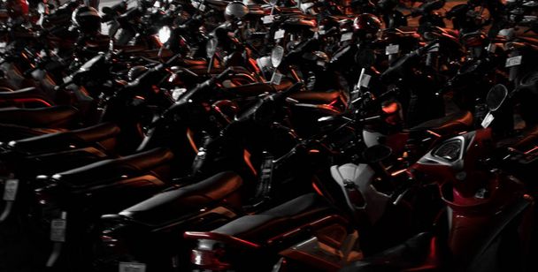 scooters parked in dense rows, beautiful night lighting, soft focus, background - Photo, Image