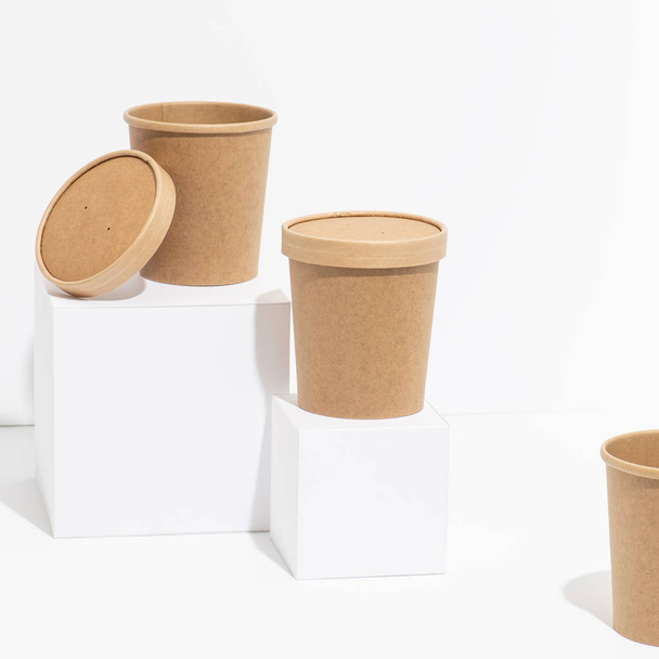 Disposable, recyclable plastic-free bamboo pots over white background - Foto, Imagen