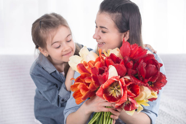 Happy mother's Day. Little cute daughter with her mother - Photo, Image
