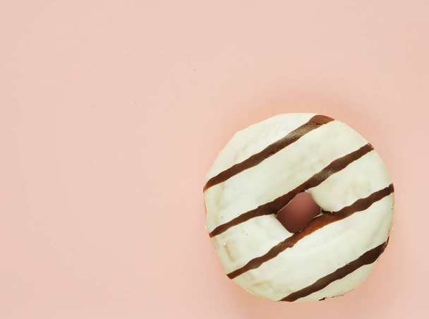 Tasty donuts on pink background. National donuts day. - Photo, image