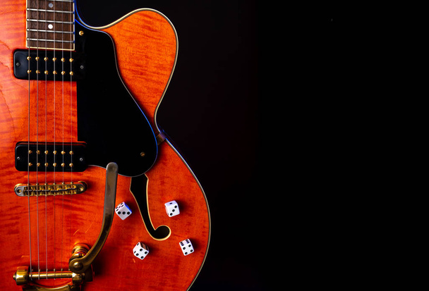 Vintage Electric Guitar, Orange flame maple, 6 String isolated on black - Photo, Image