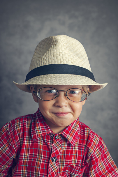 Boy in a cap and glasses - Zdjęcie, obraz