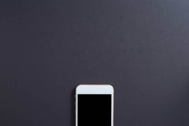 Blank smartphone with yellow background - Fotó, kép