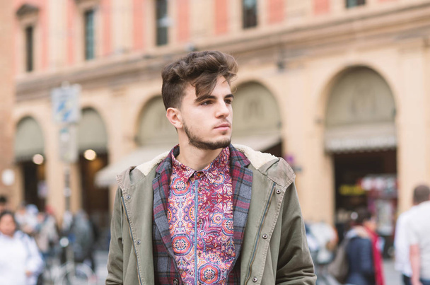 Young man portrait in the city center of Bologna, Italy. - Fotoğraf, Görsel