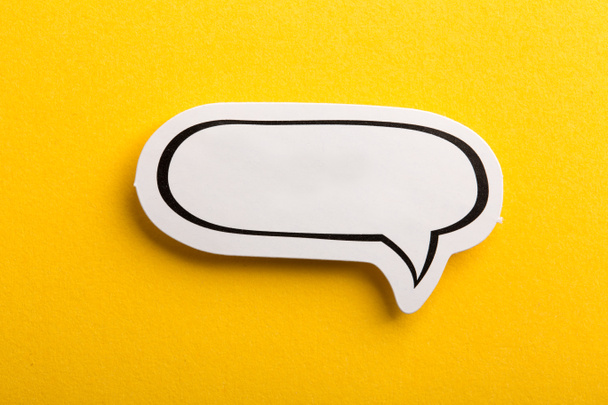 Speech Bubble Isolated On Yellow Background - Foto, immagini