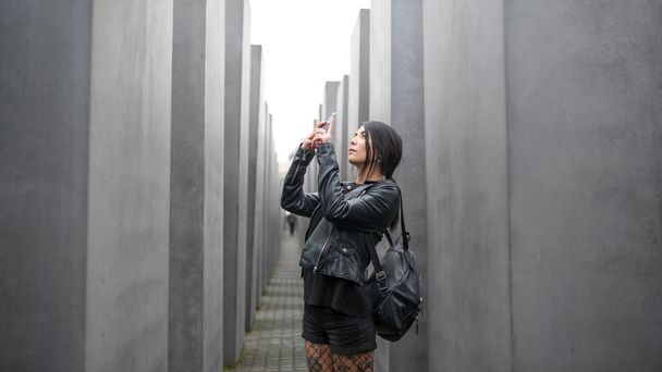 BERLIN - CIRCA JULY, 2017: Young woman taking photo inside the H - Photo, image
