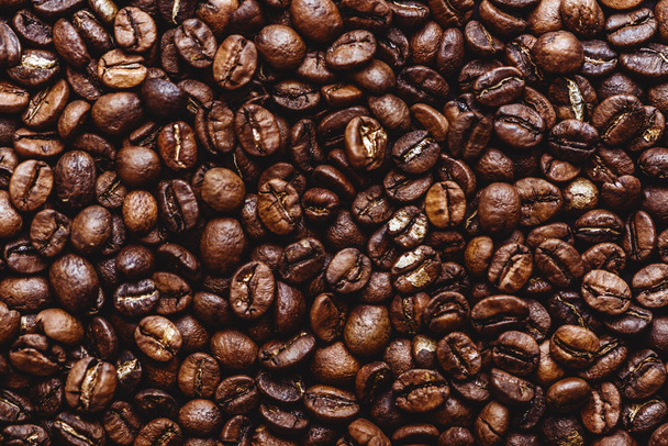 Coffee grains. Background of roasted coffee beans brown. layout. - Фото, зображення