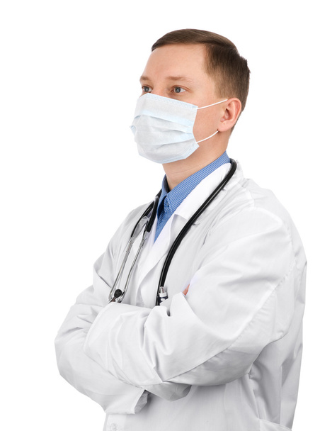 Young doctor wearing a mask - Foto, imagen