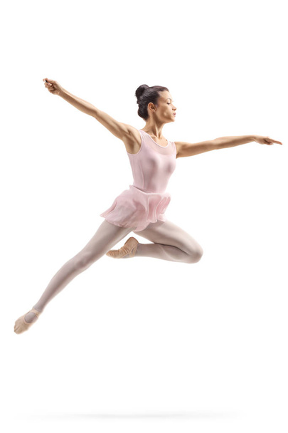 Female ballerina performing a jump - Foto, immagini