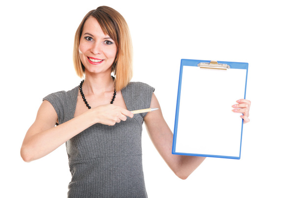 young business woman standing with her clipboard isolated - Fotó, kép