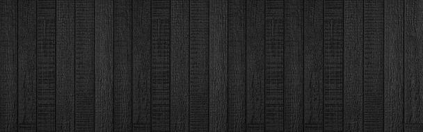 黒い天然木の壁の質感と背景シームレスのパノラマ - 写真・画像