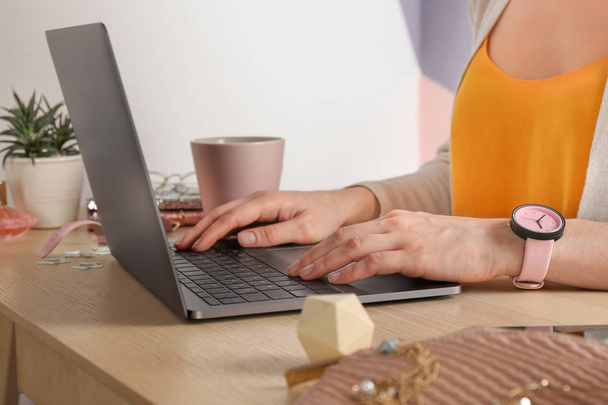 Woman using laptop at desk, closeup. Beauty blogger - Foto, imagen