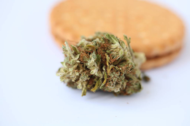 Dry cannabis medical marijuana with cookies - Foto, imagen