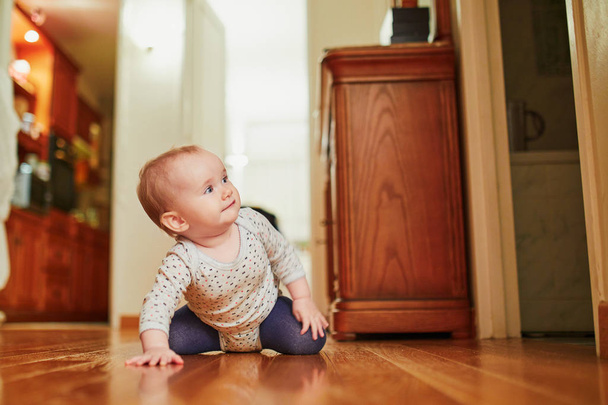 Baby girl learning to crawl - Fotó, kép