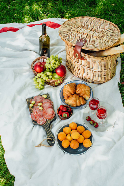 Summer picnic in the park on the green grass - Photo, Image