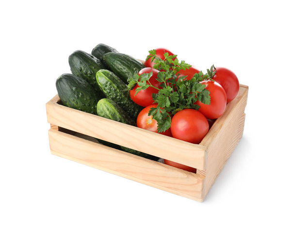 Wooden crate full of fresh vegetables on white background - Foto, afbeelding